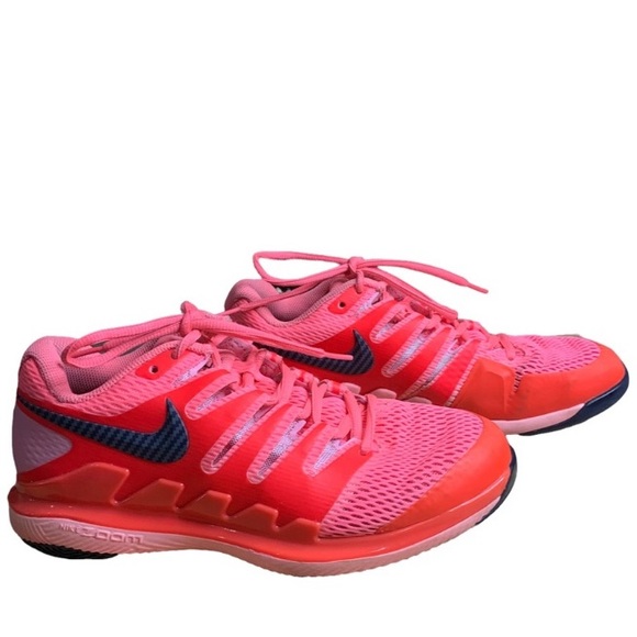 pink and red tennis shoes